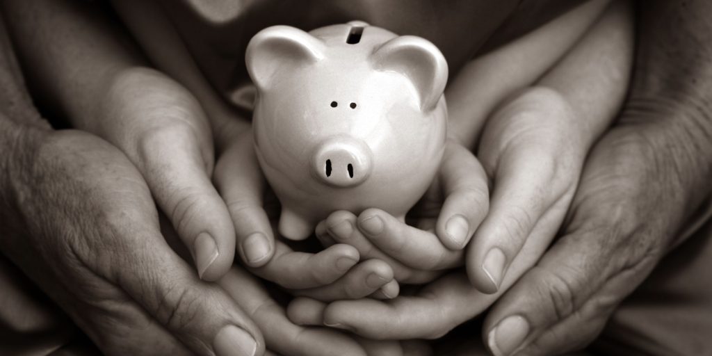 How much savings should I have, Piggy bank and families hands